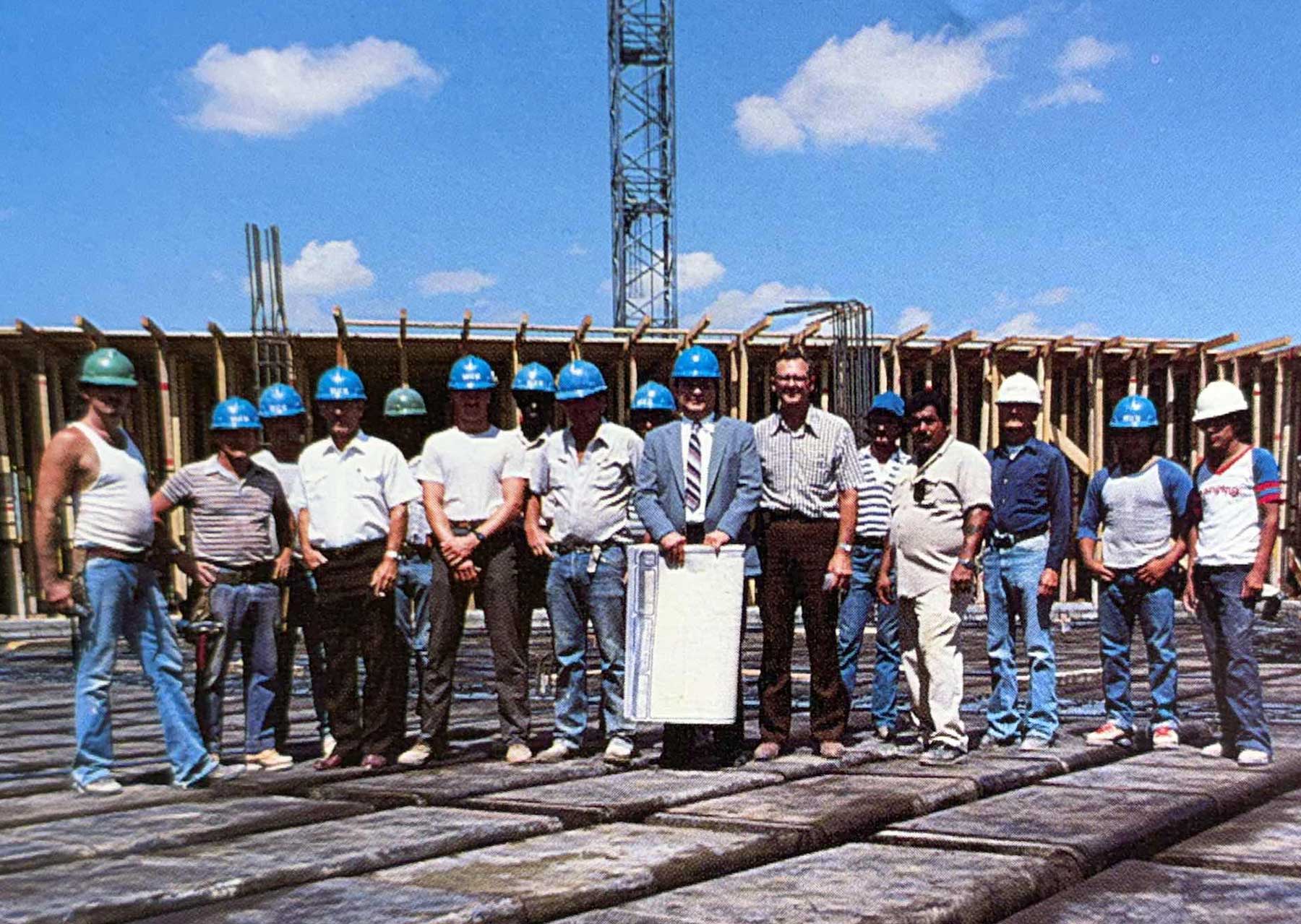 Eddie Henry and team (Eddie is holding plans)